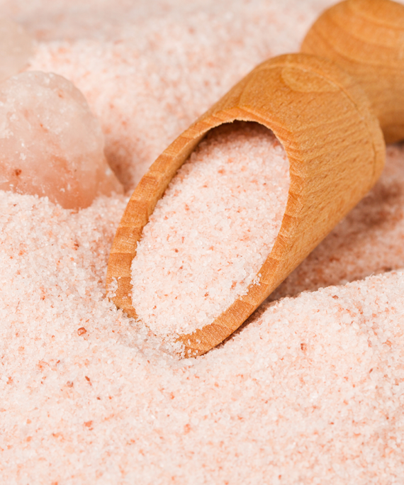 A jar of Himalayan Salt (Crushed), showcasing its fine pinkish salt crystals, a premium seasoning known for its unique flavor and exceptional mineral content.